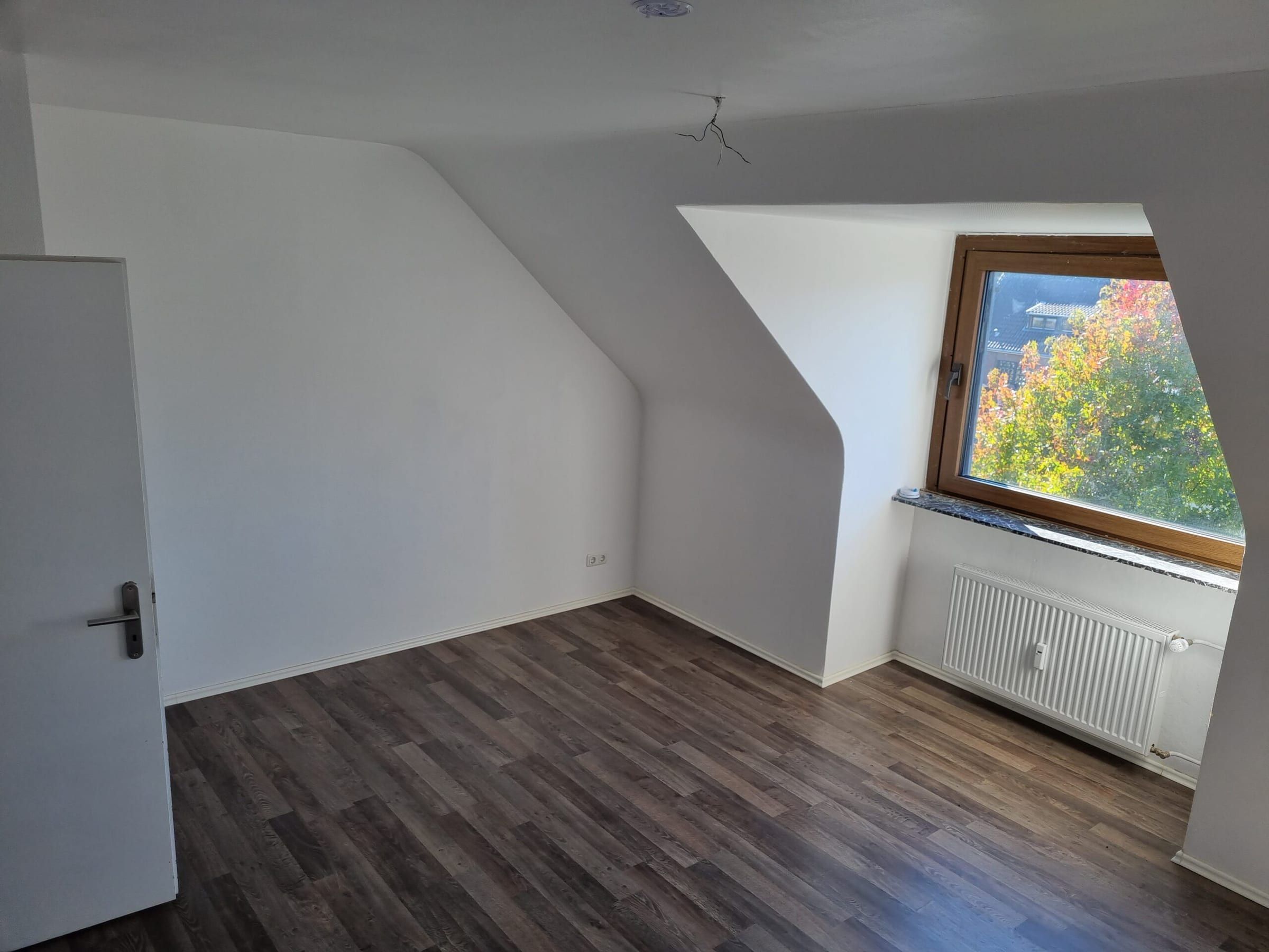 Zimmer unter dem Dach mit Gaube